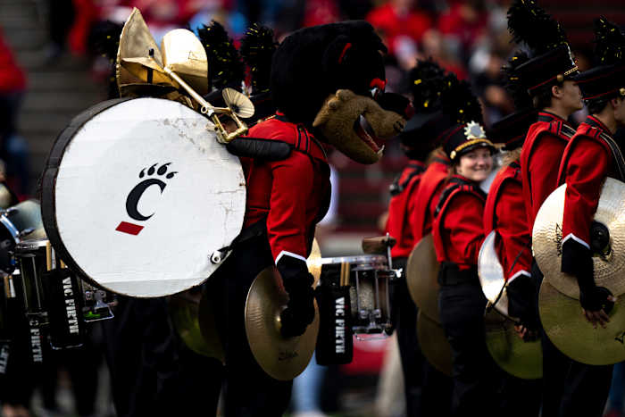 Cincinnati Bearcats mascot stands with the band before the NCAA Football game between the Cincinnati Bearcats and the South Florida Bulls at Nippert Stadium in Cincinnati on Saturday, Oct. 8, 2022. South Florida Bulls At Cincinnati Bearcats 0049